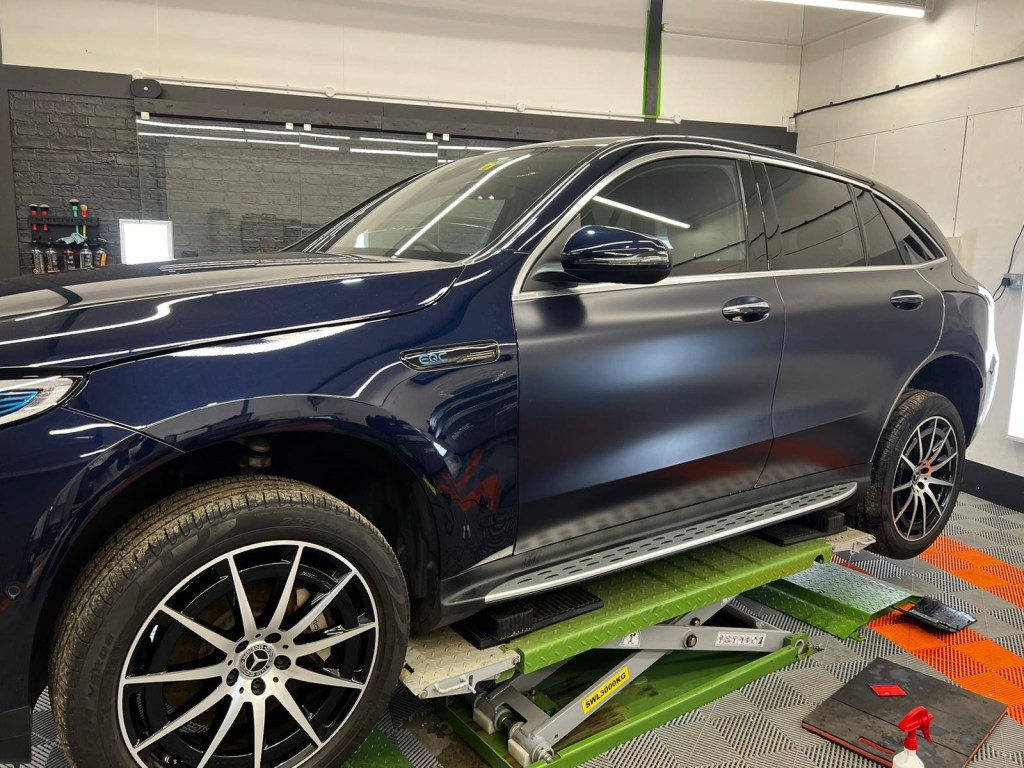 blue car with matt coating applied to half