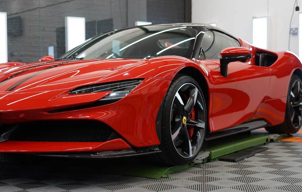 red Ferrari in Surrey detailing Garage